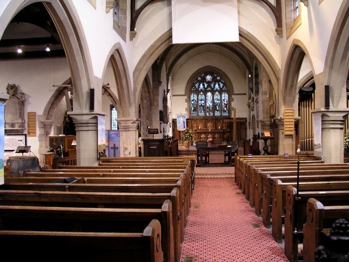 Interior of Kirkheaton Church early 21st century showing pews