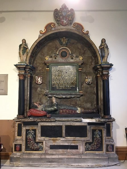Three crosses and an empty stone tomb